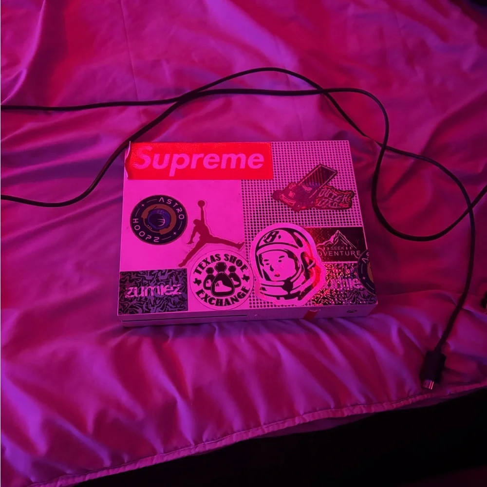 Supreme Sticker-Decorated Console Box